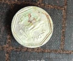 One rupee coin H mark