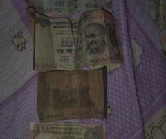 One rupee note and five rupee note
