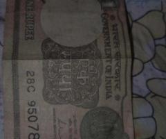 One rupee note and five rupee note