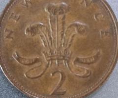 This is a copper/bronze one quarter anna coin minted during 1941 british rule