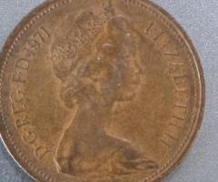 This is a copper/bronze one quarter anna coin minted during 1941 british rule