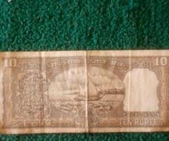 10 rupees note with boat on it