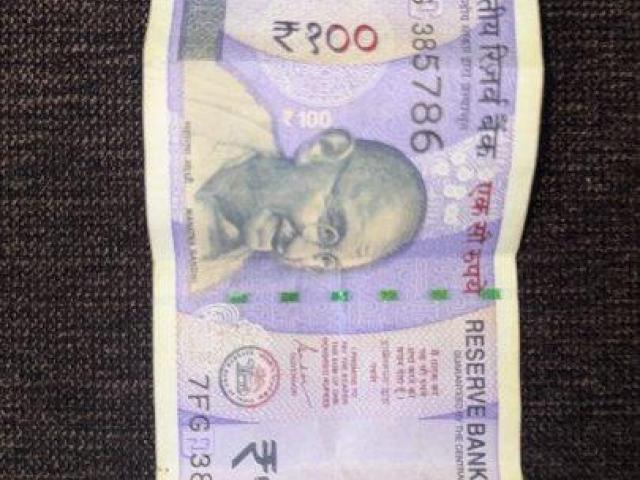 100 rupee note of 786