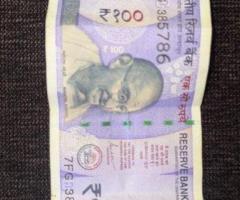 100 rupee note of 786