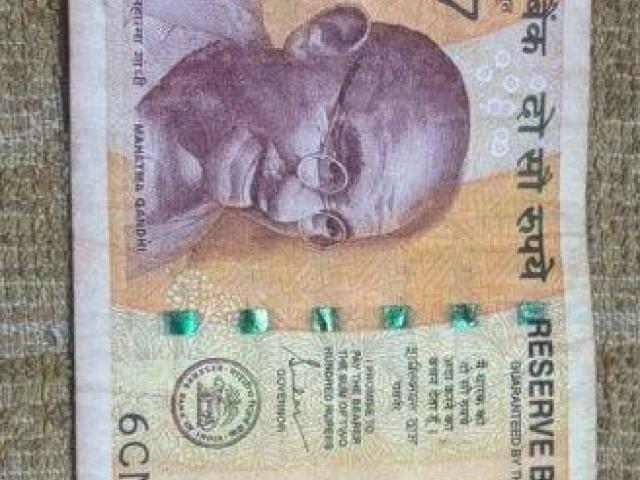 200rs with the serial number CN6 777777