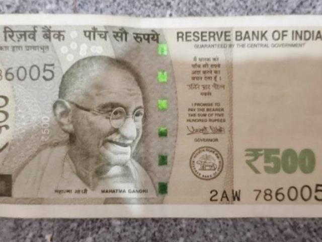 500 note with the number 786 in the starting - 786005